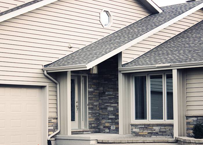 Insulated vinyl siding installation